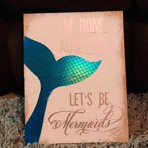 “I’m don’t adulting, let’s be mermaids” sign